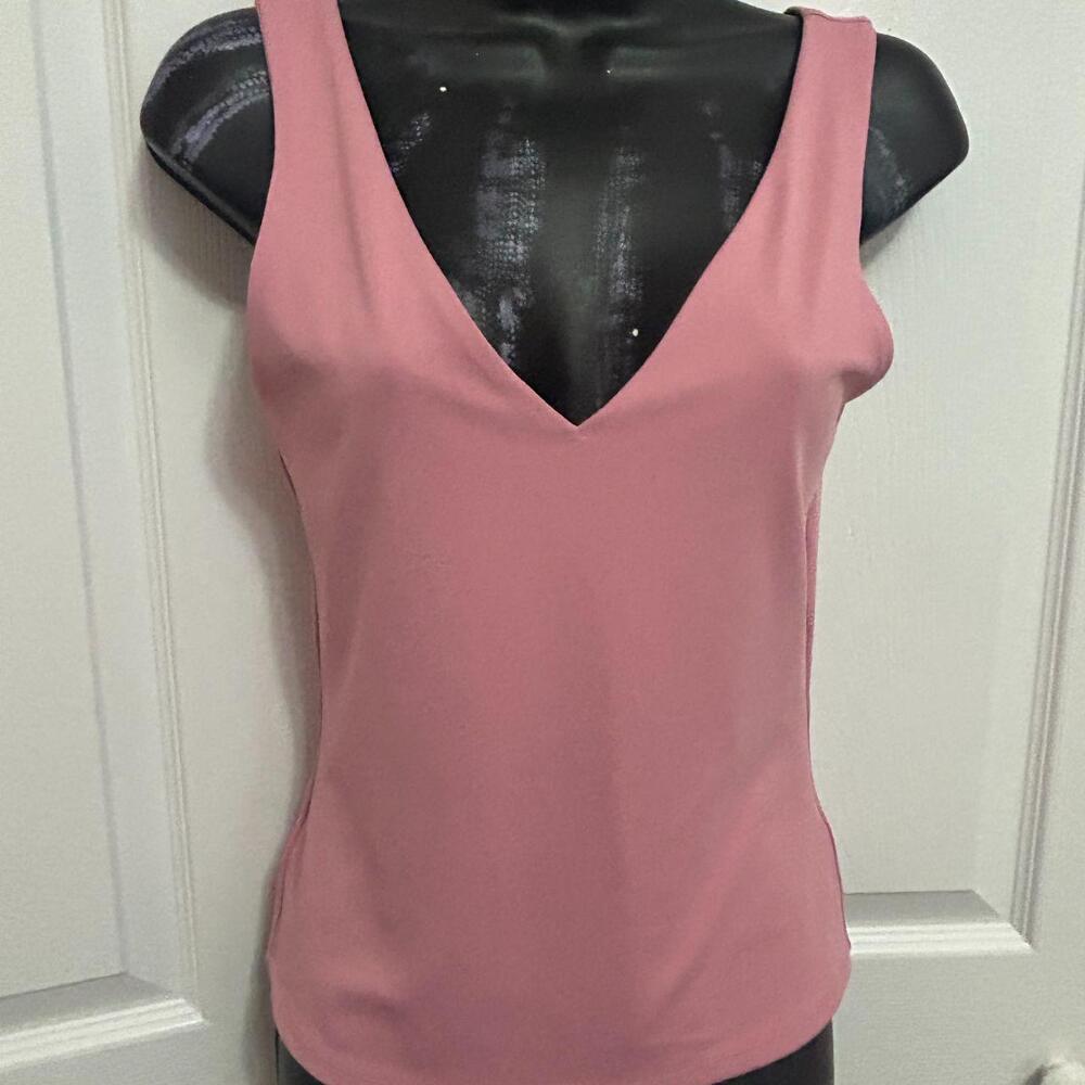 Pink V-neck Express tank. Thick spandex matrial. Super cute! Size S.